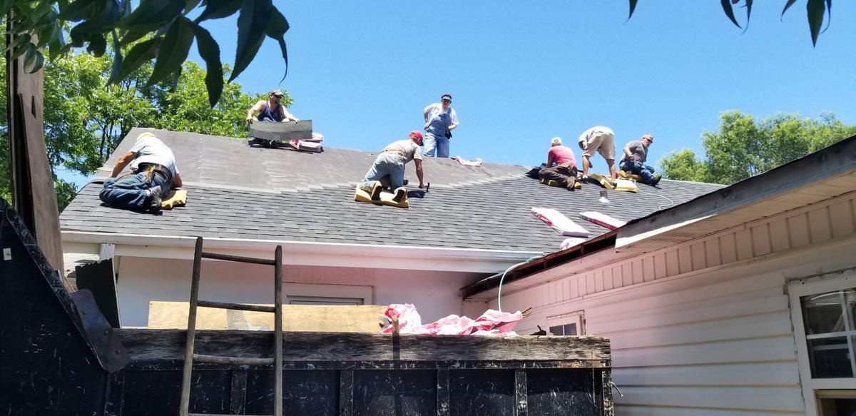 AUG - Caught - Failing Roof Brings Community Together