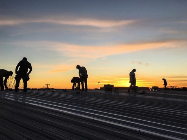 Roofers In Action