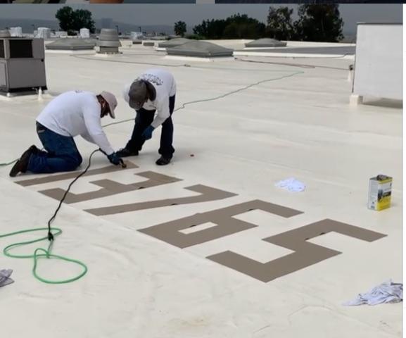 Roofers In Action