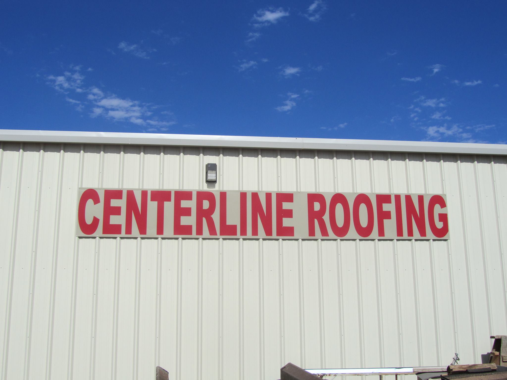 Centerline Roofing and Construction - Building Logo