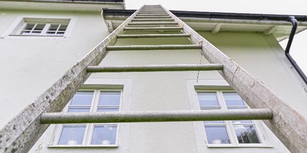 Ladder against house