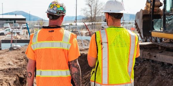 Cotney two workers talking