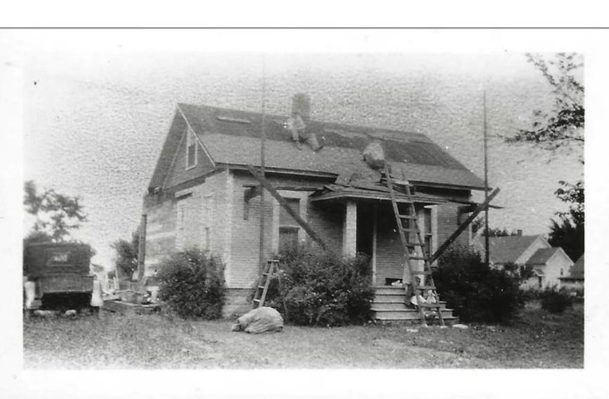 “Roofing a house in Oswego, Illinois circa 1933"