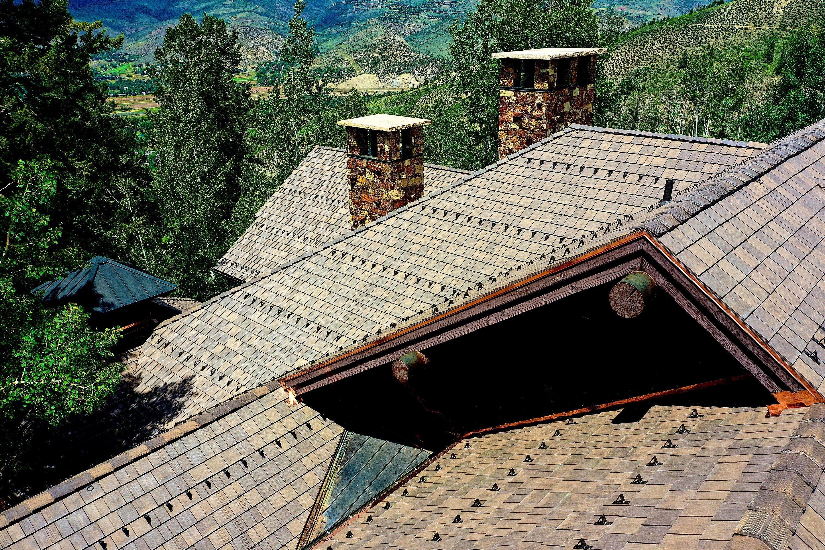 Rocky Mountain - RG 16 snow guards in dark bronze on DaVinci Select Shake by Umbrella Roofing