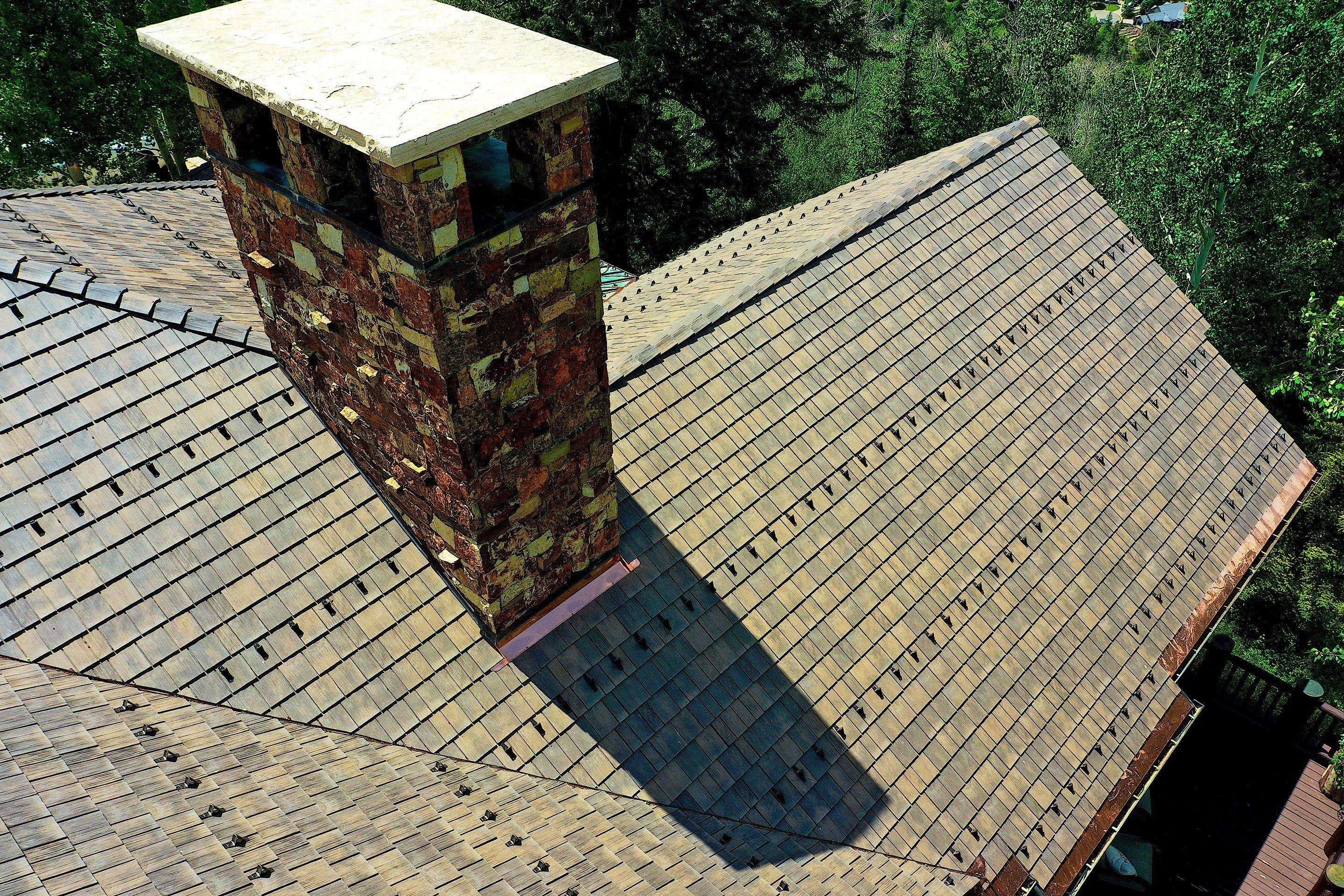 Rocky Mountain - RG 16 snow guards in dark bronze on DaVinci Select Shake by Umbrella Roofings