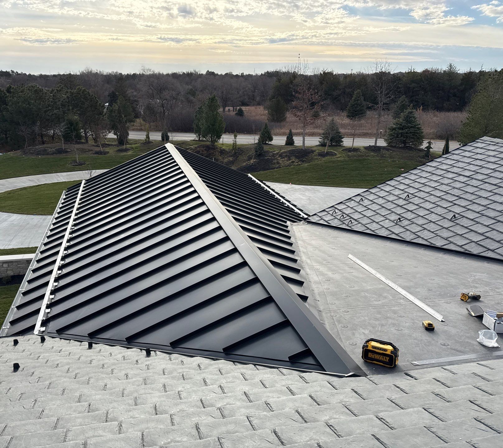 Rocky Mountain - RG10 snow guards and S-5! ColorGard with S-5! E clamps and dark bronze color strips installed by White Castle Roofing