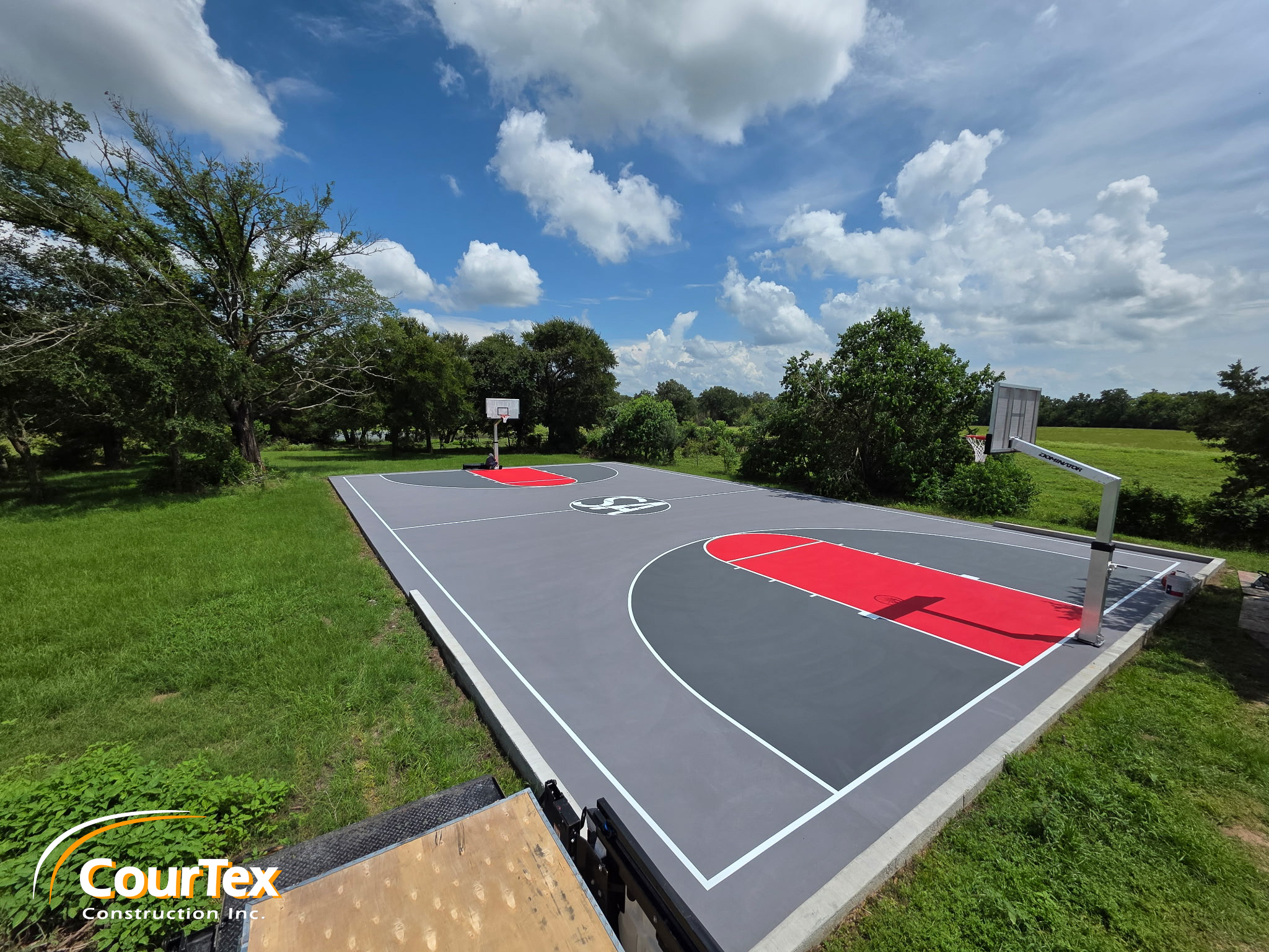 Residential New Construction Full Sized Basketball Court Grey Red - Buffalo Texas